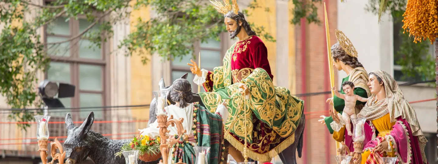 Holy Week Tour in Málaga: witness Semana Santa procession on private balcony with cultural insights.