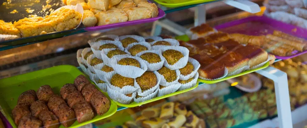 Food Tour in Istanbul from Europe to Asia: Turkish breakfast, street eats, ferry ride, markets.