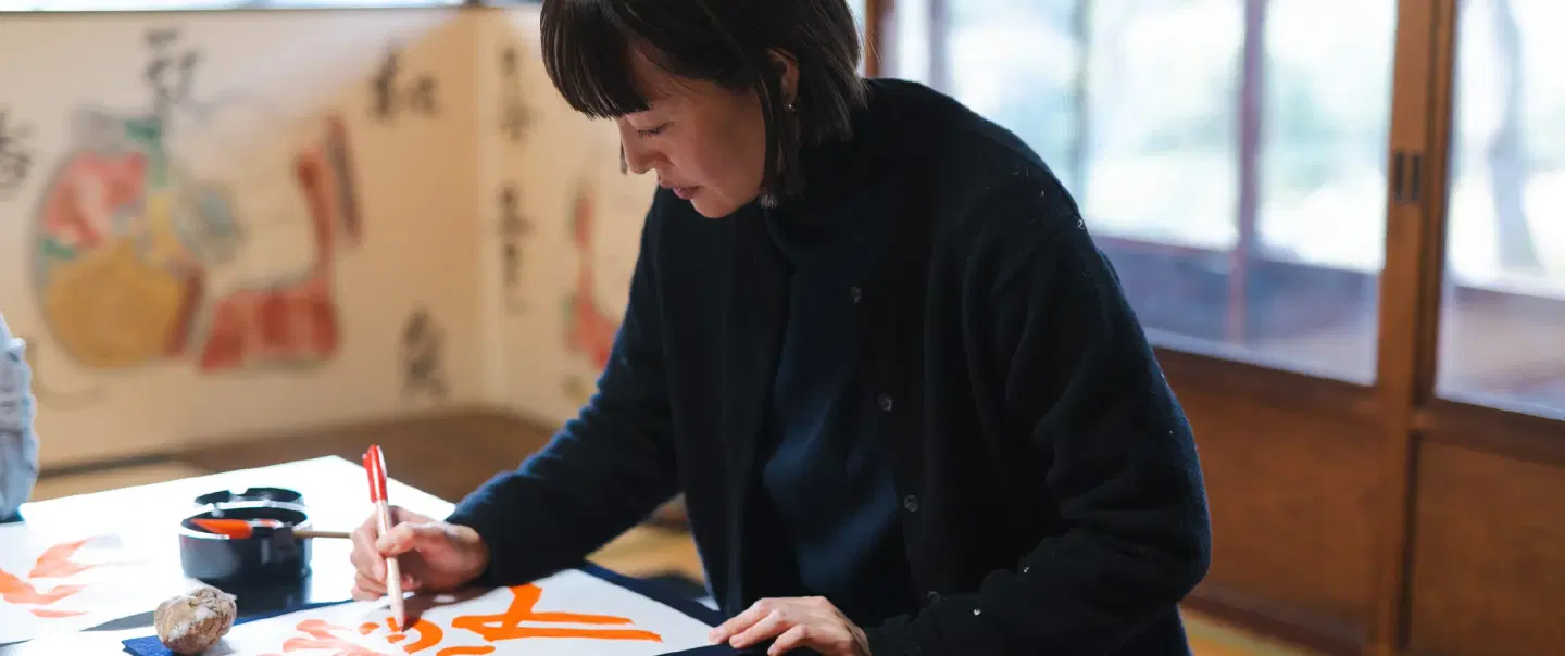 Craft and Culture Workshop in Kyoto held in a temple exploring the world of Japanese Calligraphy.