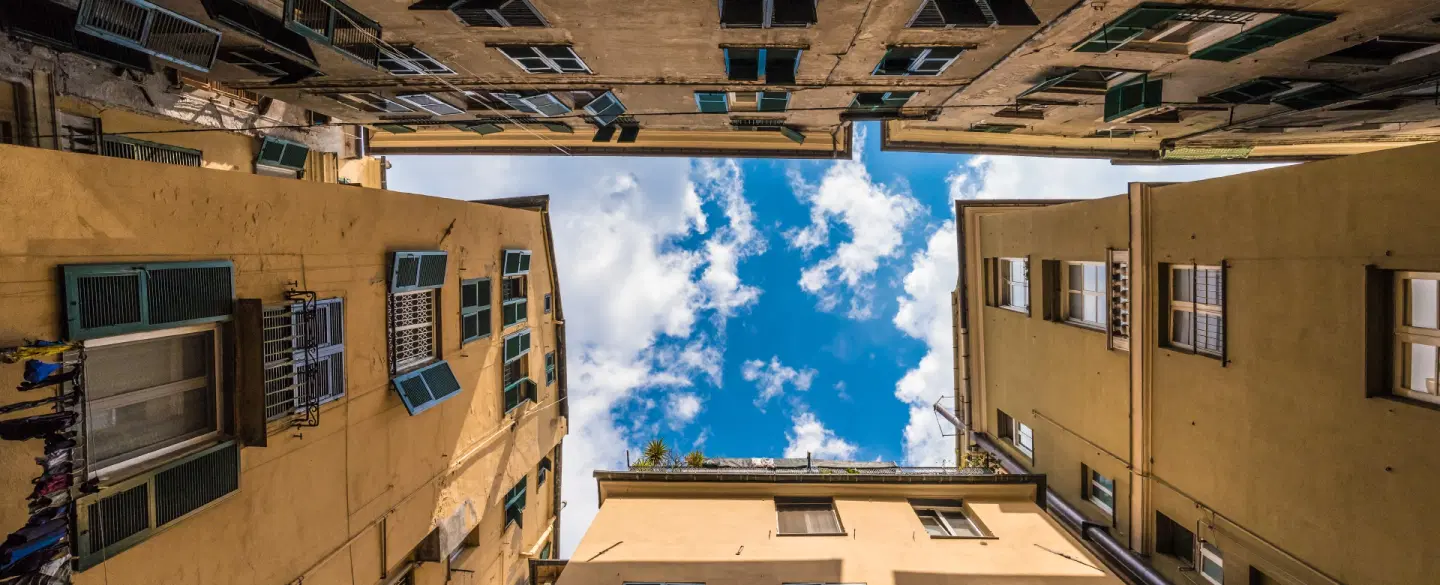 Photo Walk in Genoa’s Caruggi exploring historic alleys and facades on a day trip from Milan.