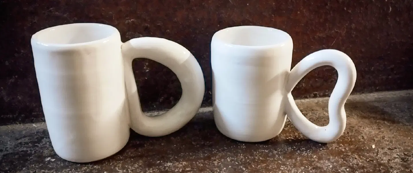 Pottery Workshopin Vietri, near Naples, shaping mugs together in a hands-on workshop for couples.