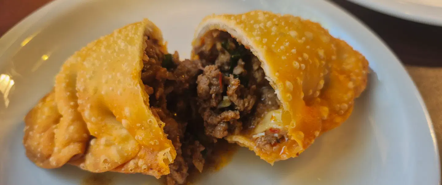 Food Tour of Palermo Soho, Buenos Aires, tasting empanadas, asado, choripan, & Argentine must-eats.