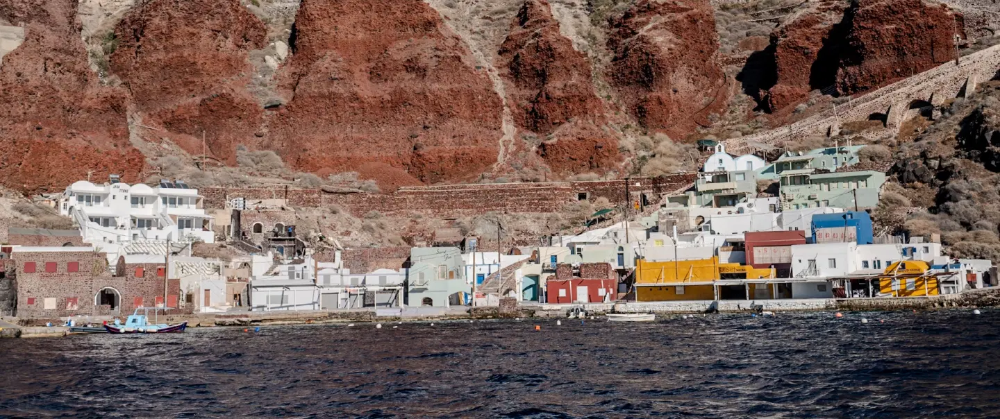 Island Tour in Santorini with morning sightseeing and a private sunset cruise along the caldera.