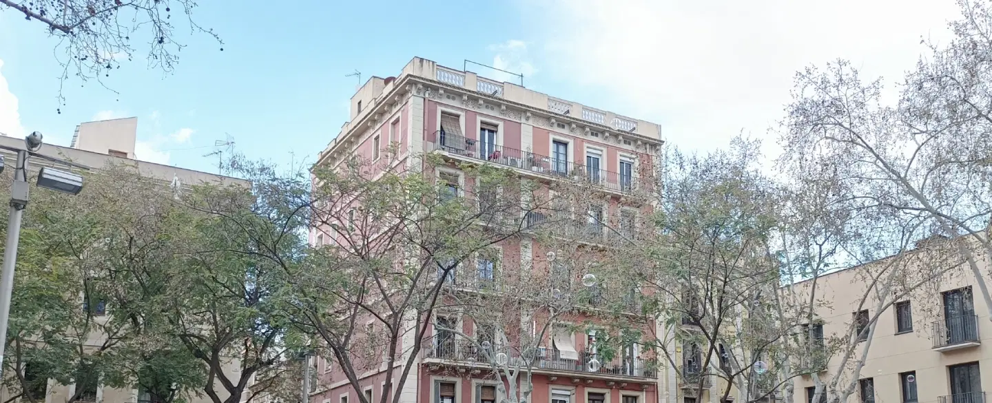 Walking Tour of Gràcia in Barcelona exploring uprisings, civil war sites & oysters with local wine.
