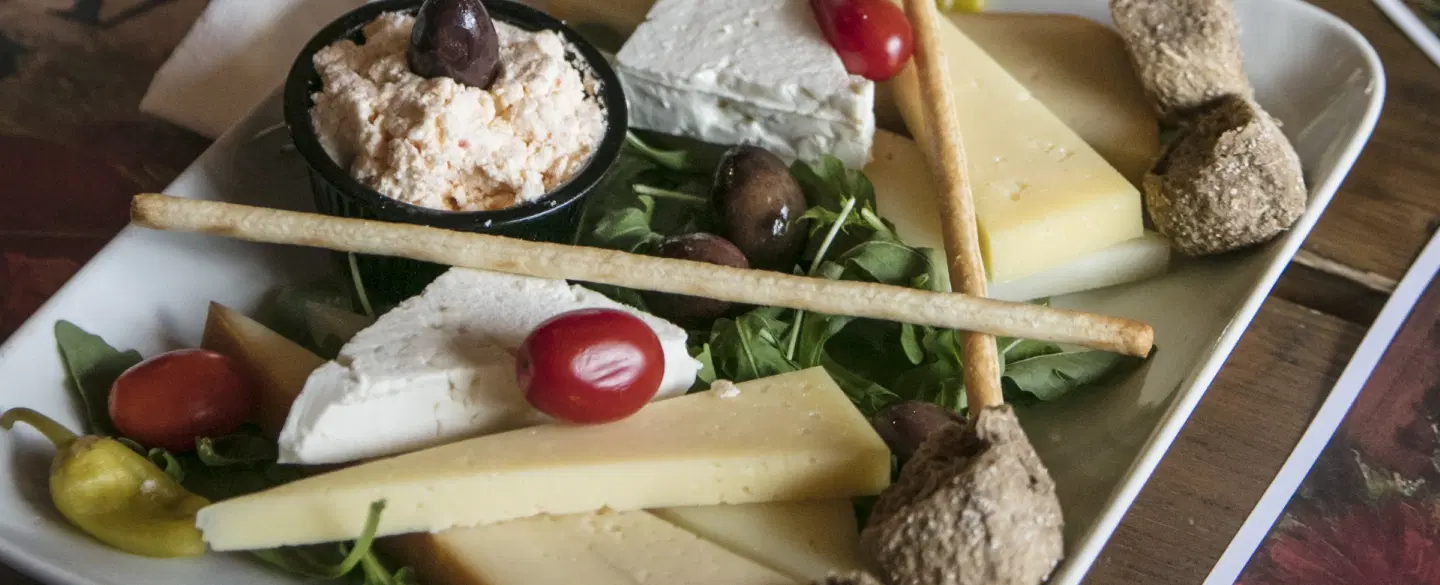 Food Tour in Athens visiting the oldest market, tasting local specialties and meeting Greek vendors.