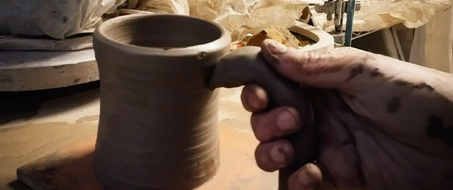 Pottery Workshopin Vietri, near Naples, shaping mugs together in a hands-on workshop for couples.