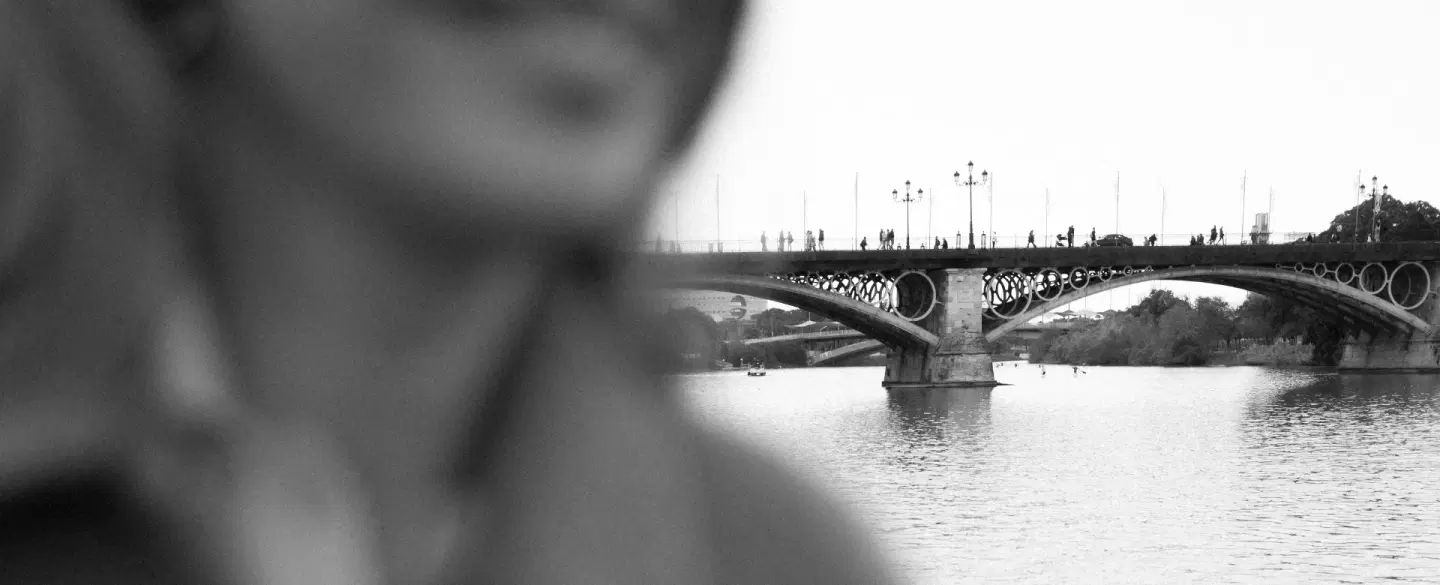 Couples Photo and Video Session in Seville capturing Triana, riverside streets, and local moments.