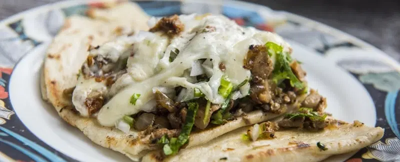 Food Tour in Mexico City: Taste iconic tacos & tortillas at Medellín Market with a culinary expert.