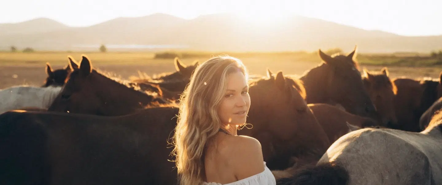 Sunset portrait photoshoot in Cappadocia with galloping wild Yılkı horses and expert photographer.

