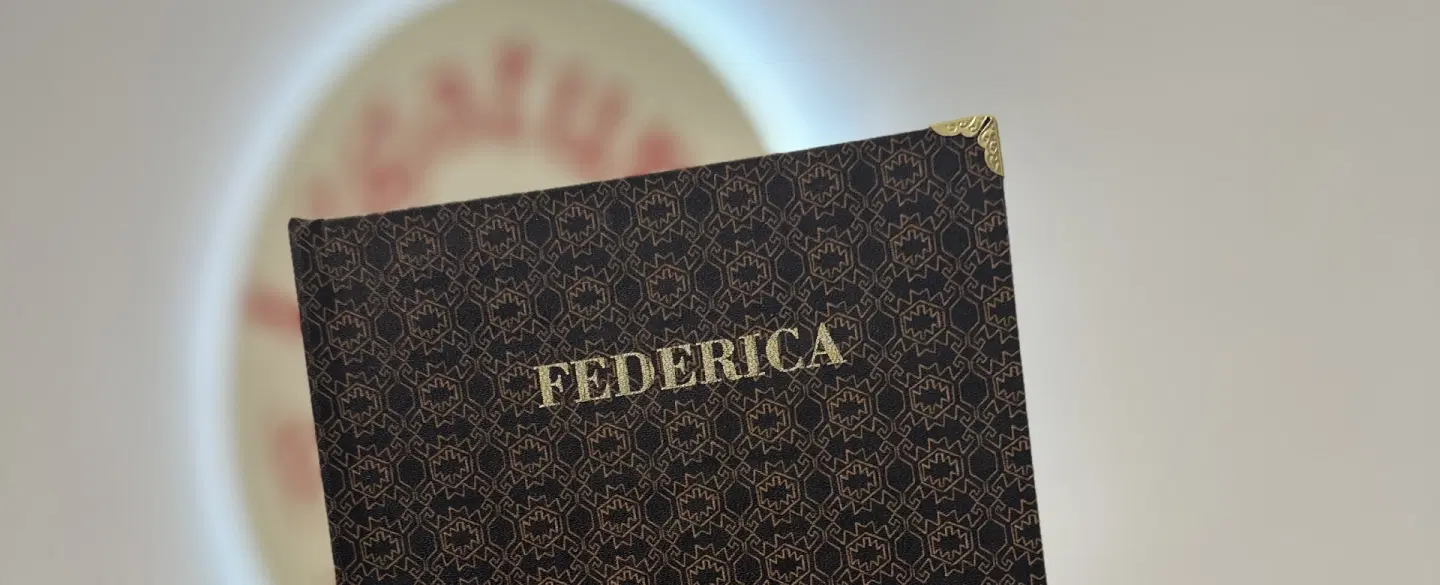 Craft Workshop in Cagliari, Sardinia creating your travel notebook in a historic bookbinding studio.