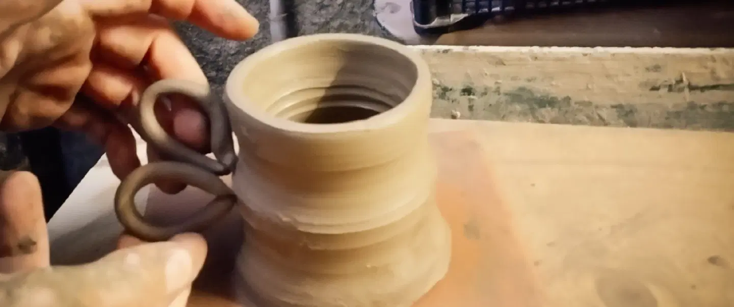 Pottery Workshopin Vietri, near Naples, shaping mugs together in a hands-on workshop for couples.