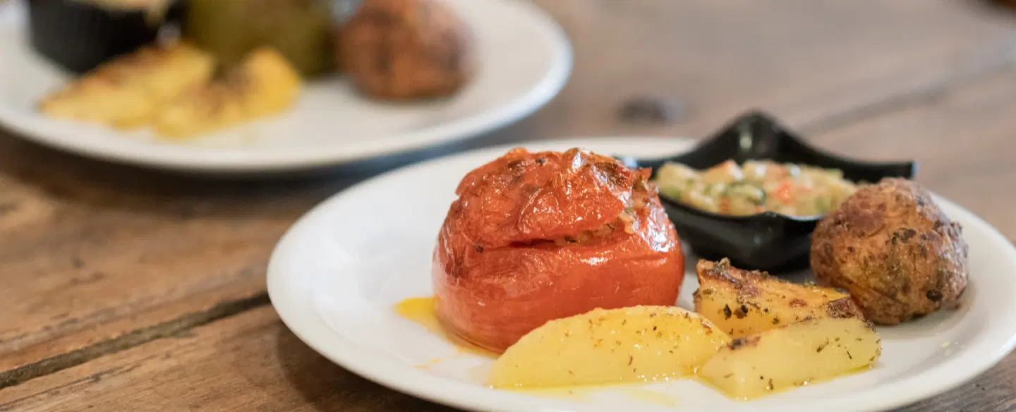 Food Tour in Athens visiting the oldest market, tasting local specialties and meeting Greek vendors.
