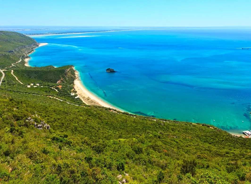 Setúbal Day Trip from Lisbon on a 4x4, with Galapinhos Beach, cave visit, vineyards, and cliffs.
