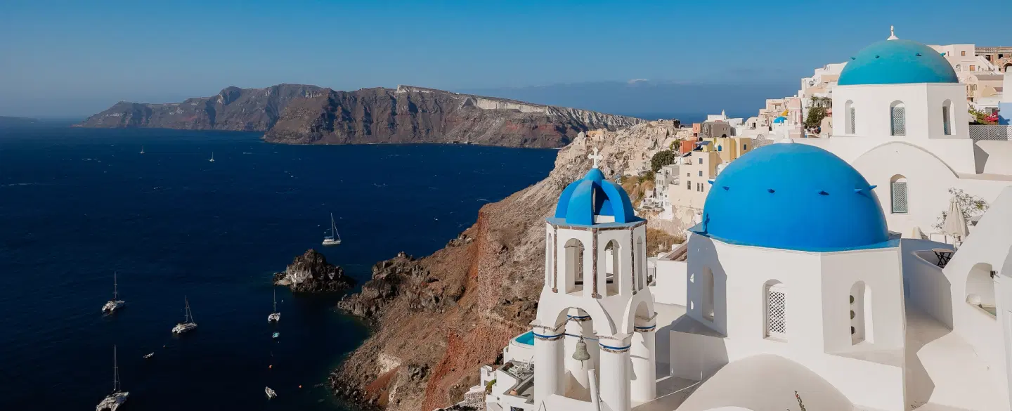 Sightseeing Tour in Santorini exploring villages, caldera views and enjoying local food experiences.