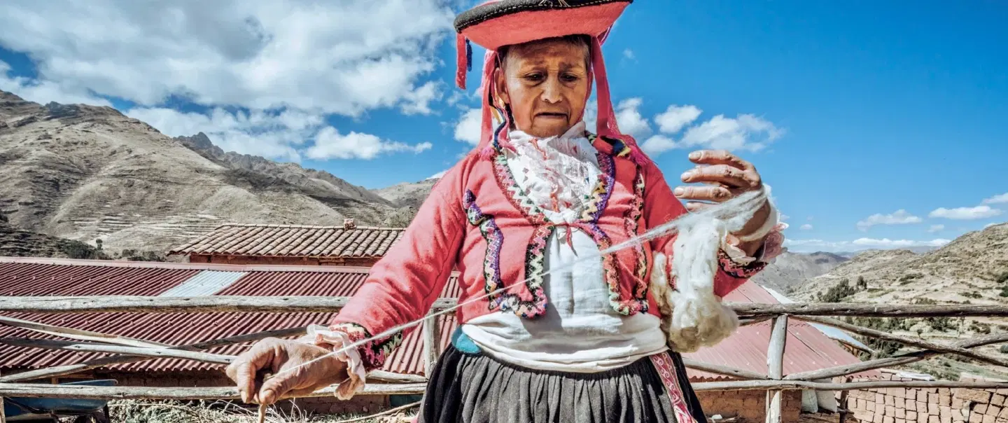 Sacred Valley Day Trip with a Quechua community in Pisac, Kinsaccocha Lake Hike, weaving and lunch.