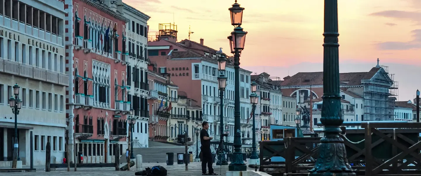 Walking Tour in Venice at sunrise through Piazza San Marco, quiet calli, and Rialto Market.