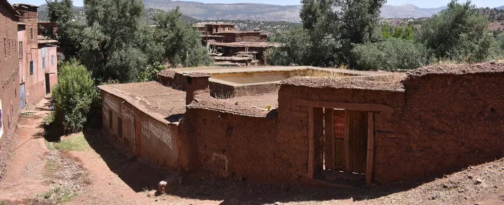 Hiking Trek of Ouirgane Valley near Marrakesh in Atlas Mountains with villages, forests, synagogue.
