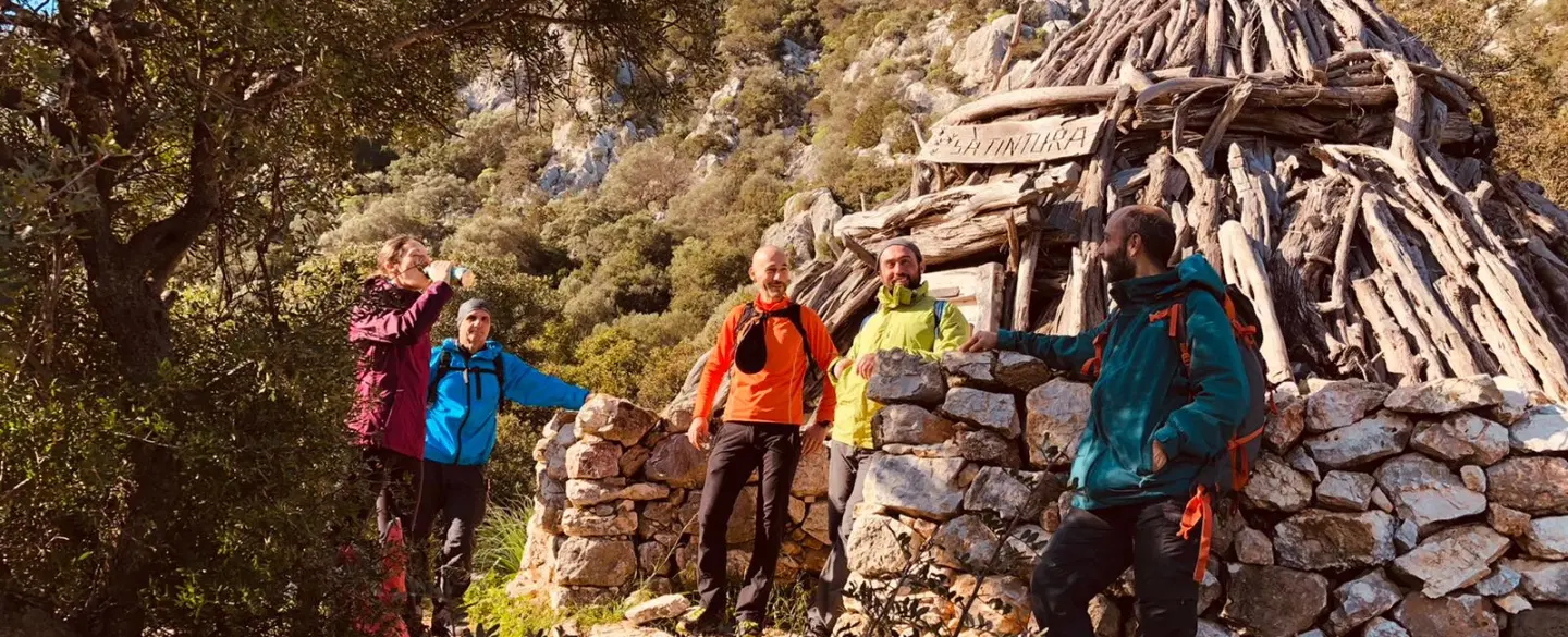 Hiking Tour in Sardinia from Orosei to Cala Cartoe with sea views, shepherd hut and beach picnic.