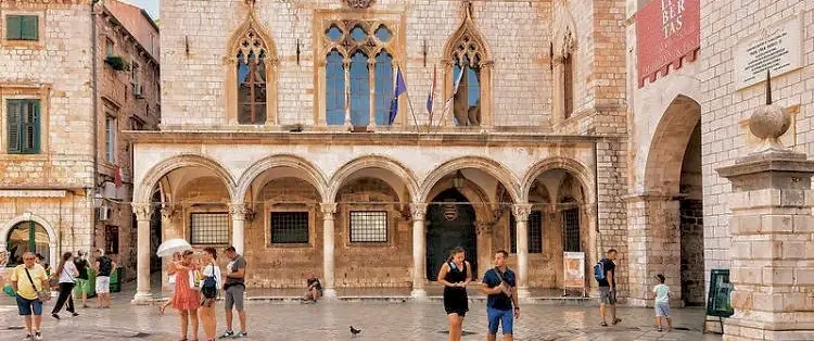 Walking Food Tour in Dubrovnik exploring social history, traditional dishes and local wine pairings.