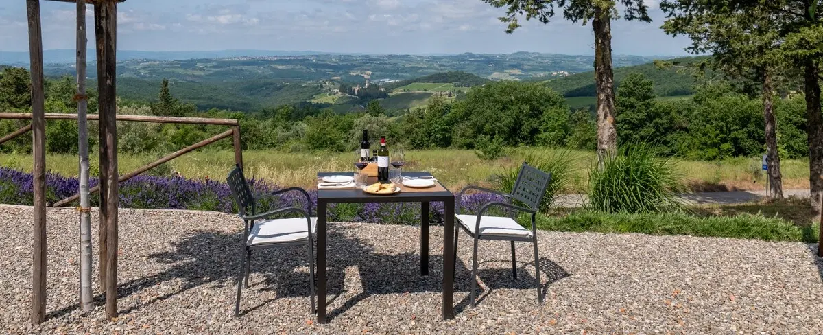 Hiking Tour in Chianti from Florence through abbey paths and vineyards in the Tuscan rolling hills.