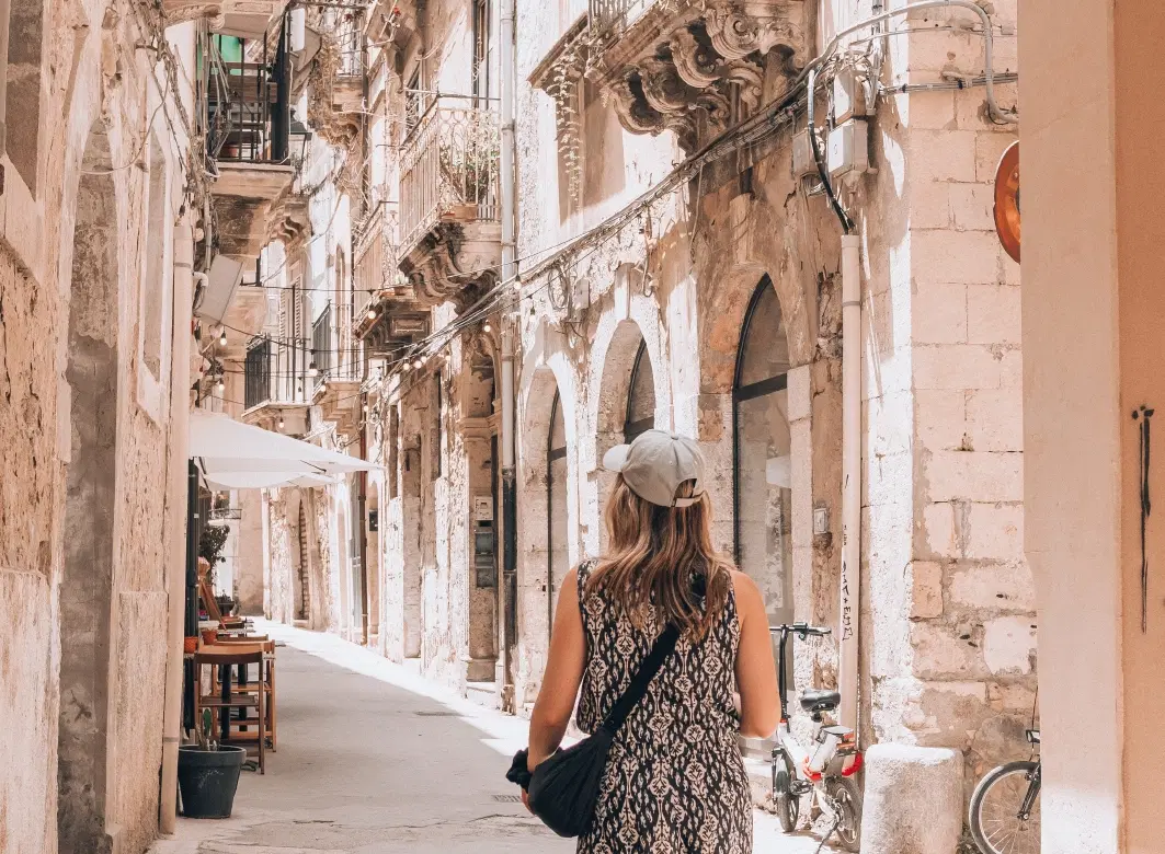 Walking Tour in Sicily, exploring Ortigia’s charming streets, a food market and an olive oil farm.