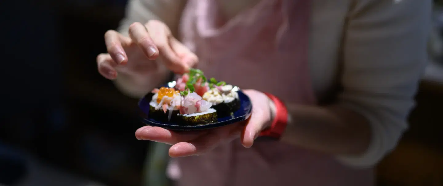 Cooking Demonstration in Kyoto with seasonal home cooking and sake pairings in a historic shop.