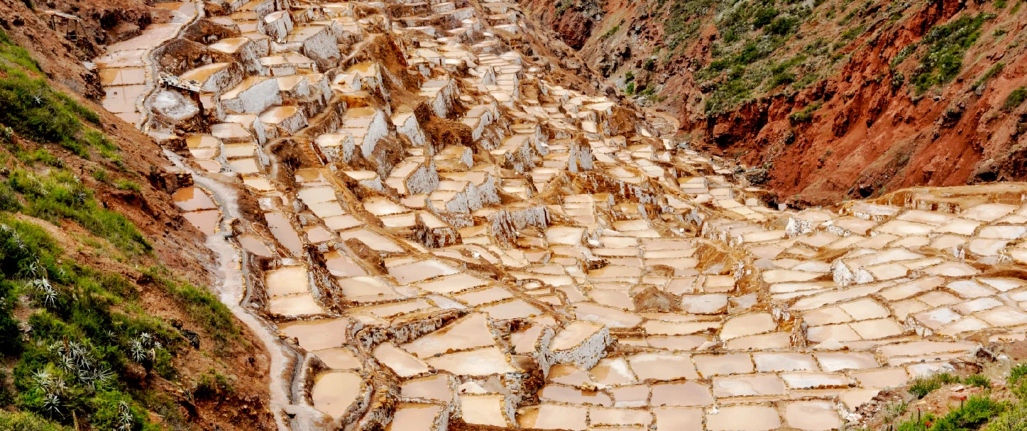 Day Trip from Cusco to Sacred Valley Inca sites including Ollantaytambo, Moray, and Maras.