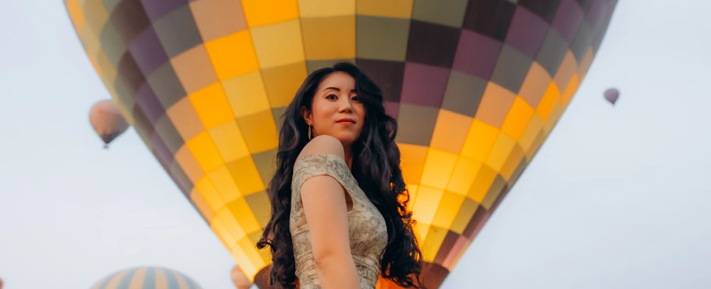 Photoshoot in Cappadocia at sunrise with hot air balloons, caves, valley views, expert photographer.