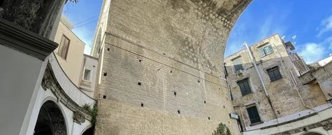 History Tour in Naples' Sanità walking Fontanelle ossuary, Baroque palaces, faith and folk devotion.