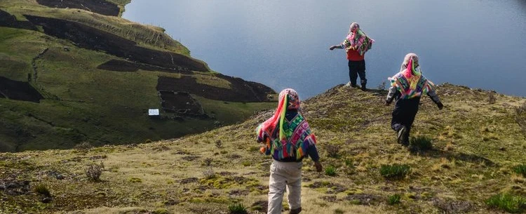 A Sacred Valley photography tour near Cusco: Calca market, portraits, family home, alpaca blessing.