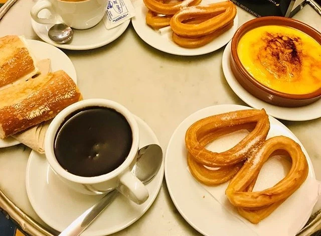Market Tour with Tastings in Barcelona through Sant Antoni, La Boqueria, and Santa Caterina Markets.
