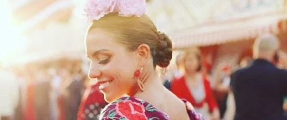 Cultural Experience in Seville: Feria de Abril makeover, flamenco-inspired hair, makeup & flowers.