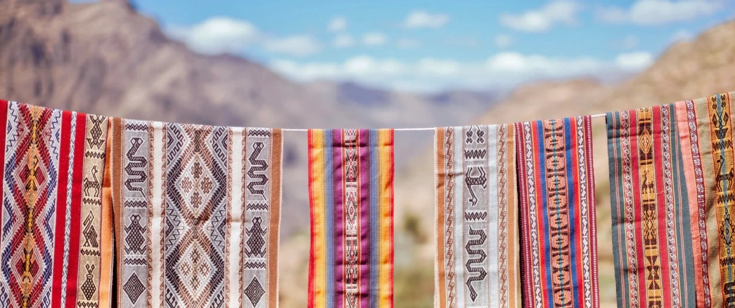 Sacred Valley Day Trip with a Quechua community in Pisac, Kinsaccocha Lake Hike, weaving and lunch.