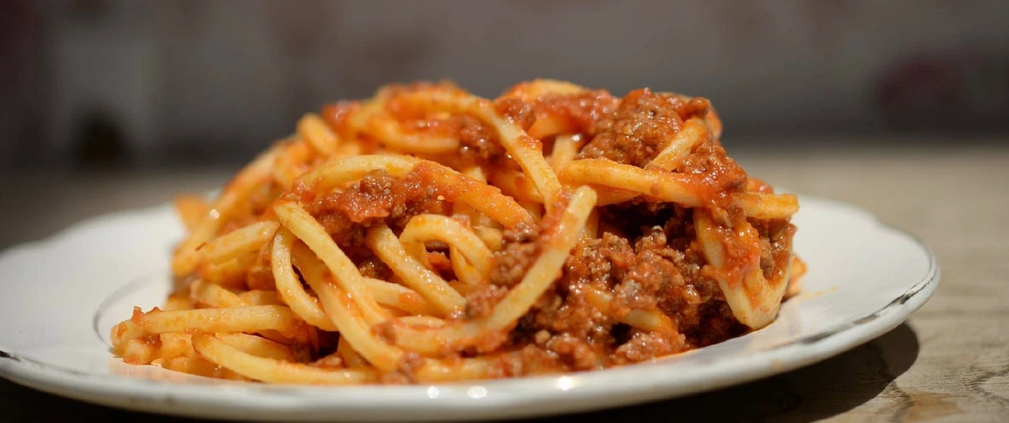 Dining Experience in Rome: Taste Nonna-style home food & family stories in a tiny market kitchen.