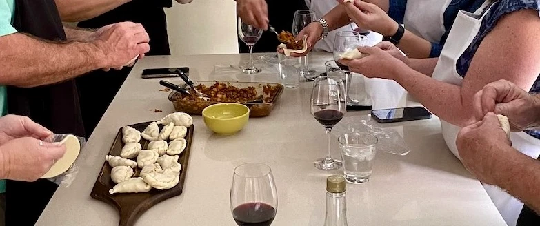 Cooking Class in Buenos Aires making Argentine empanadas in a local home, with wine and dessert.