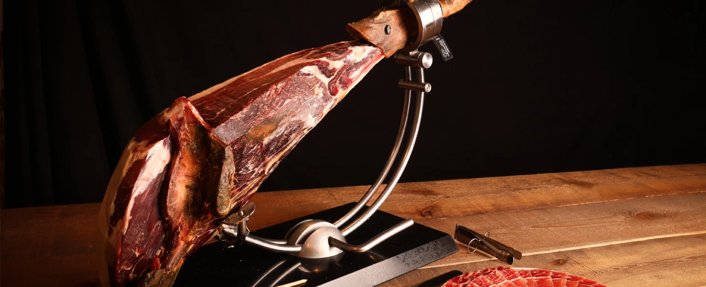 Culinary Workshop in Madrid with Iberian ham slicing, artisan cheese, and regional wine pairings.