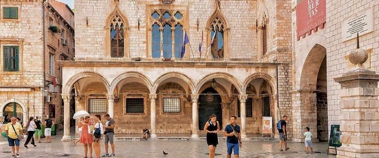 Walking Food Tour in Dubrovnik exploring social history, traditional dishes and local wine pairings.