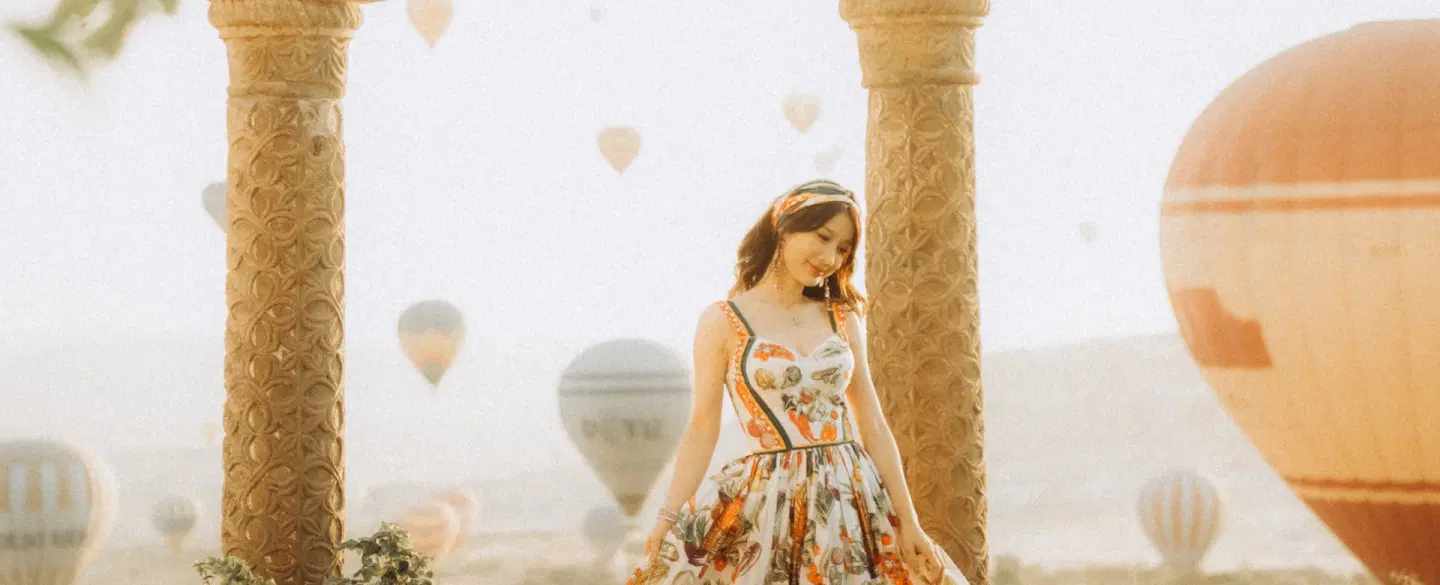 Photoshoot in Cappadocia at sunrise with hot air balloons, caves, valley views, expert photographer.