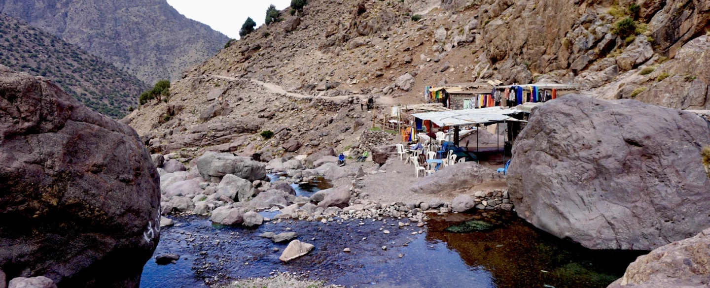 Hiking Trek to the sacred shrine of Sidi Chamarouch in Atlas Mountains from Imlil near Marrakesh.