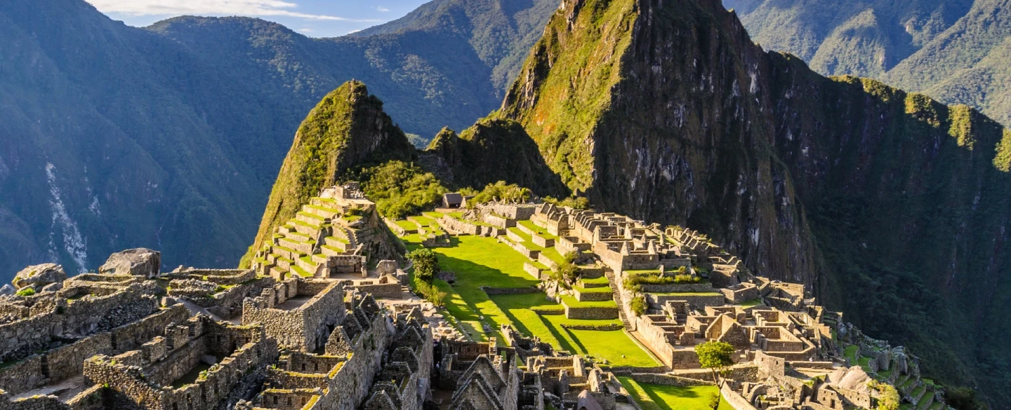 Day Trip from Cusco to Machu Picchu with luxury panoramic train and guided Inca citadel walk.