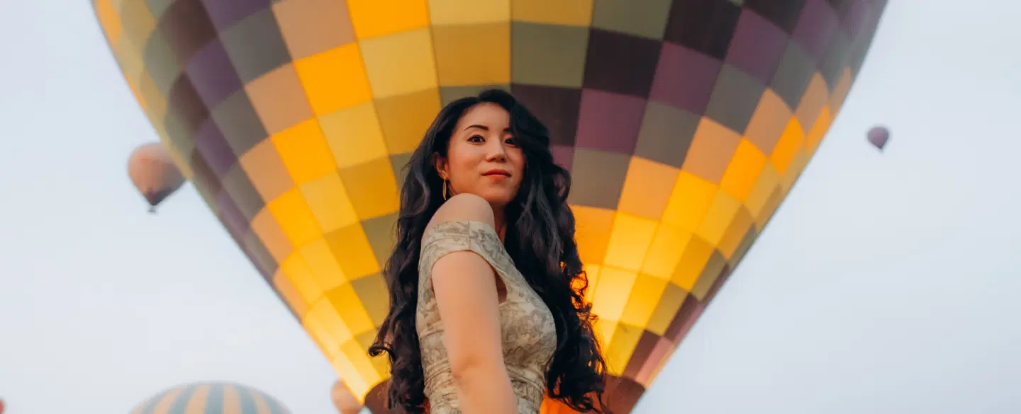 Photoshoot in Cappadocia at sunrise with hot air balloons, caves, valley views, expert photographer.