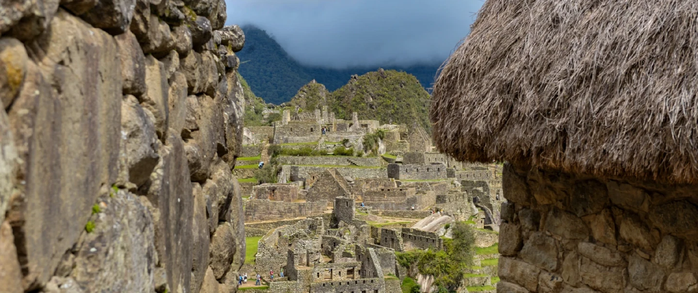 Day Trip from Cusco to Machu Picchu with luxury panoramic train and guided Inca citadel walk.