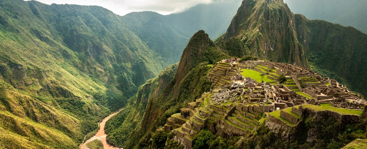 Day Trip from Cusco to Machu Picchu with luxury panoramic train and guided Inca citadel walk.