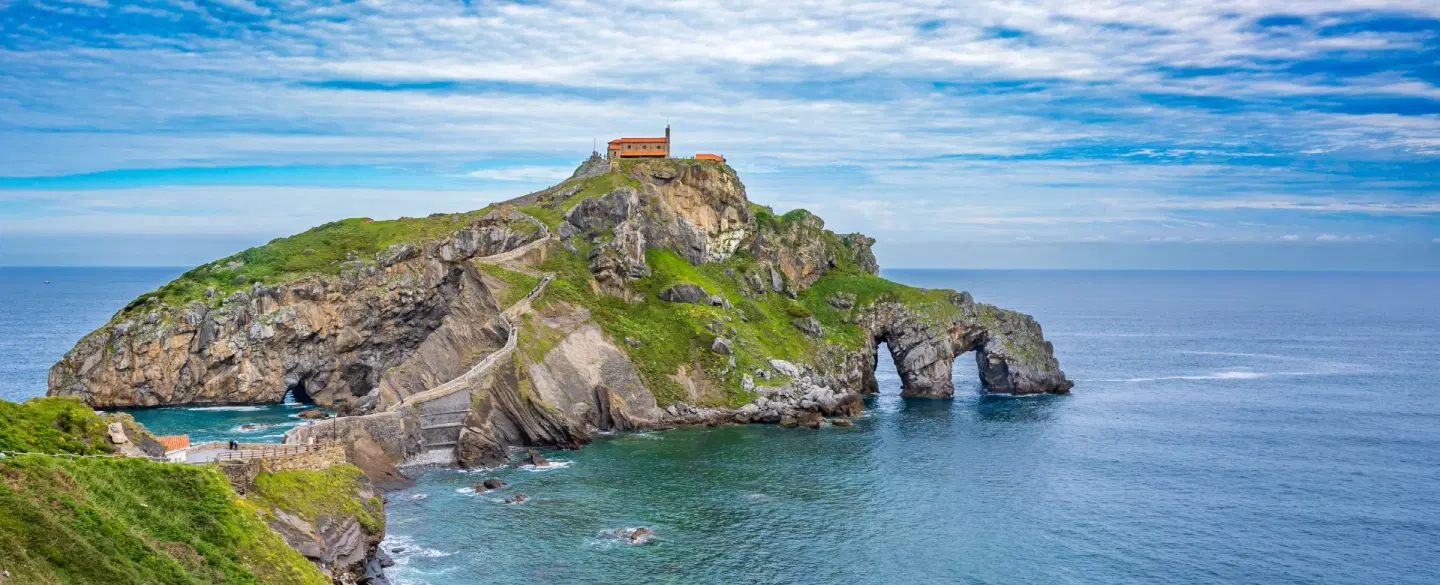 Day Trip from Bilbao with transport to Basque coast, Guernica, painted forest and txakoli vineyards.