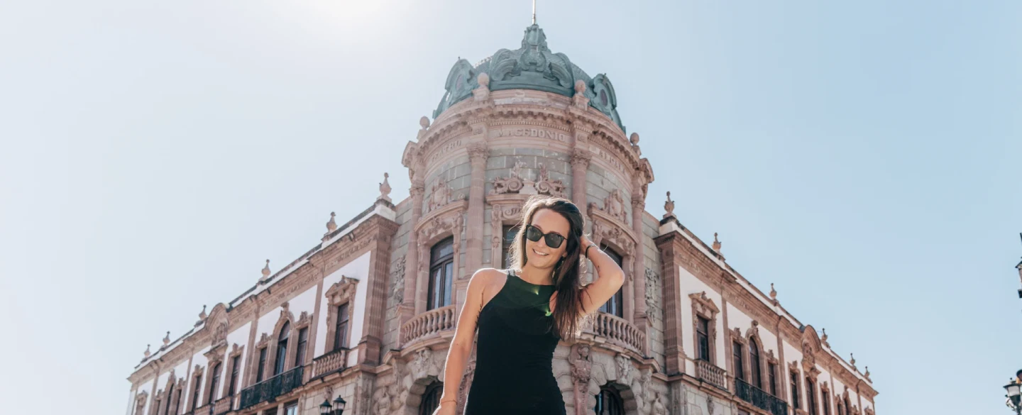 Portrait Photoshoot in historic Jalatlaco in Oaxaca with pastel streets, churches, and murals.