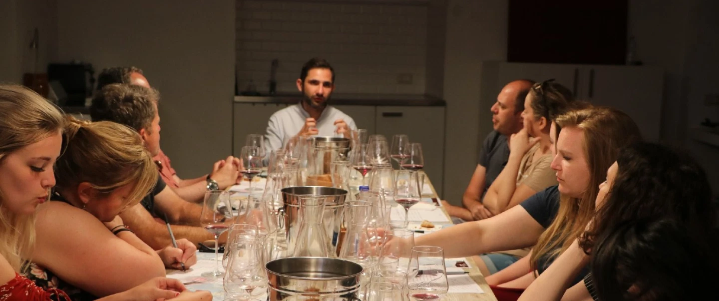 Wine Tasting in Rome, in a private wine club with an expert Italian sommelier guiding the session.