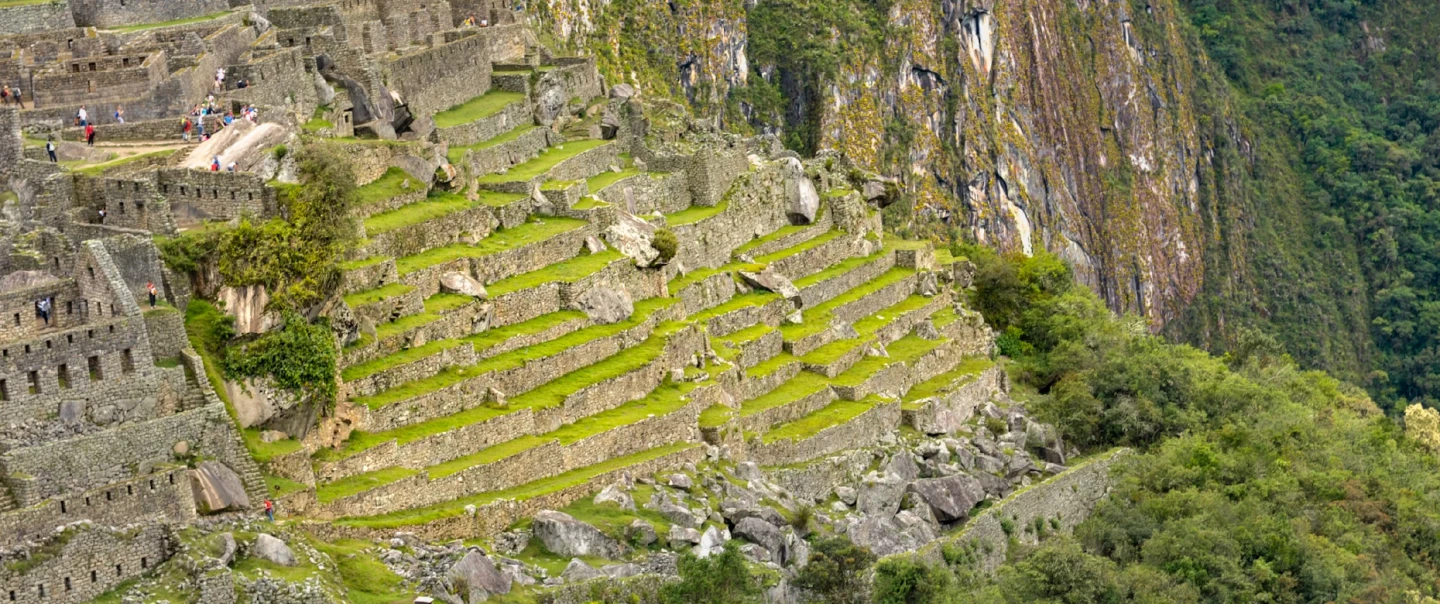 Day Trip from Cusco to Machu Picchu with luxury panoramic train and guided Inca citadel walk.