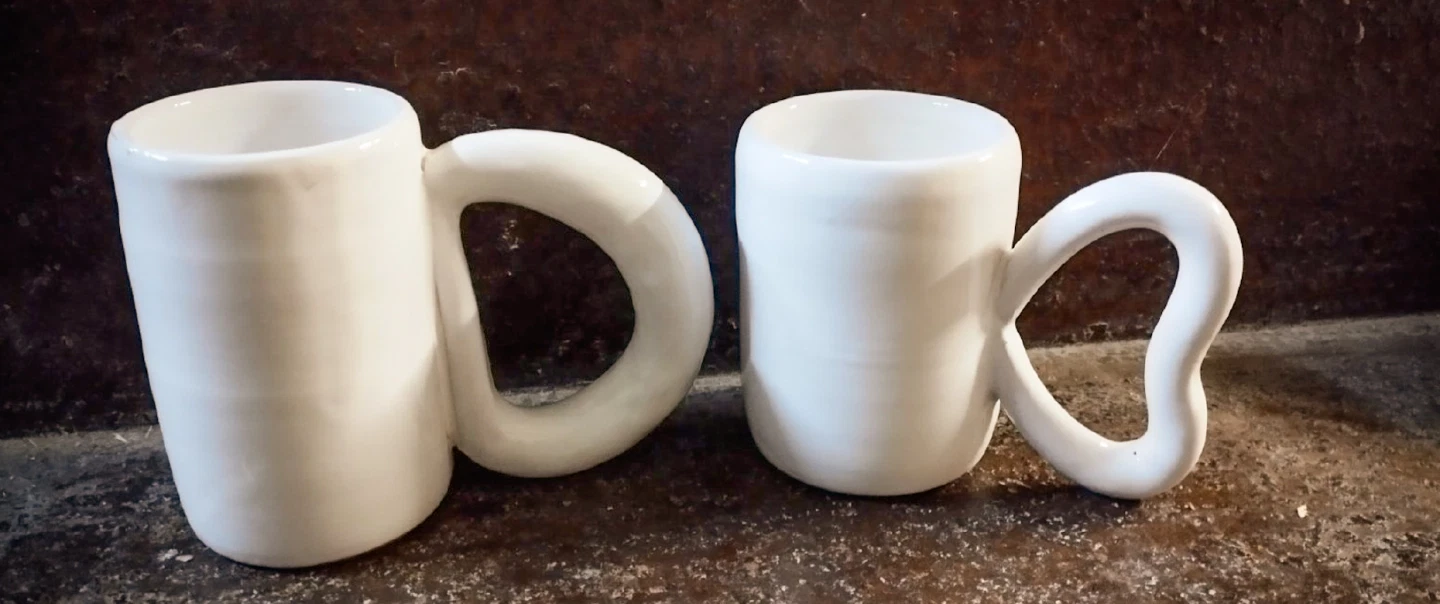 Pottery Workshopin Vietri, near Naples, shaping mugs together in a hands-on workshop for couples.