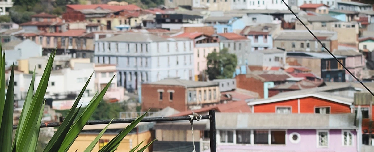 Photography Walk through Playa Ancha in Valparaíso, Chile with colorful hillside & local landmarks.