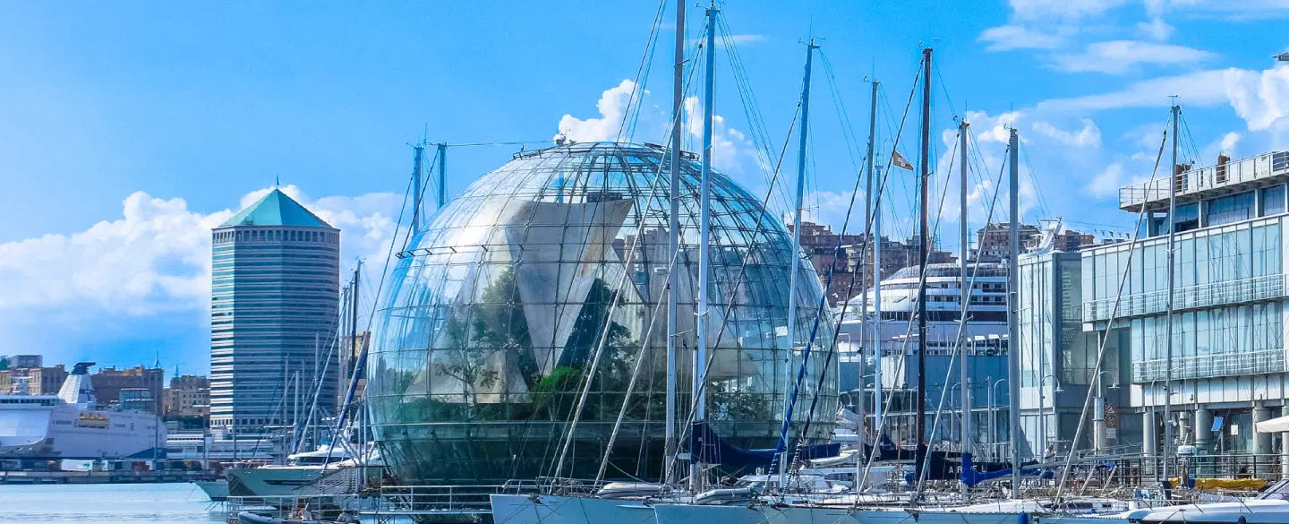 Photo Walk in Genoa exploring Porto Antico’s iconic architecture, as a day trip from Milan.